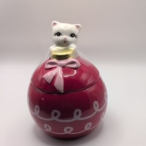 Adorable White Cat With Ornament Jar